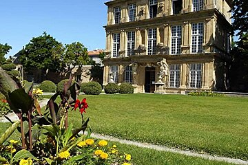 image of a house and gardens