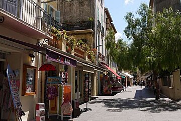 photo of a street with shops