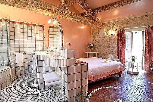 photo of a bedroom and bathroom