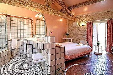 photo of a bedroom and bathroom