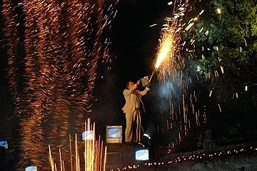 image of a man with fireworks