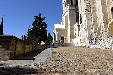 photo of acobbled lane and buildings