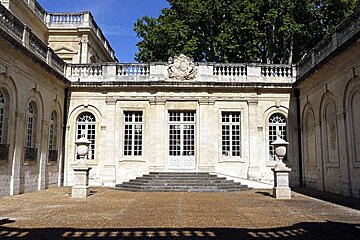 photo of a stone building and courtyard