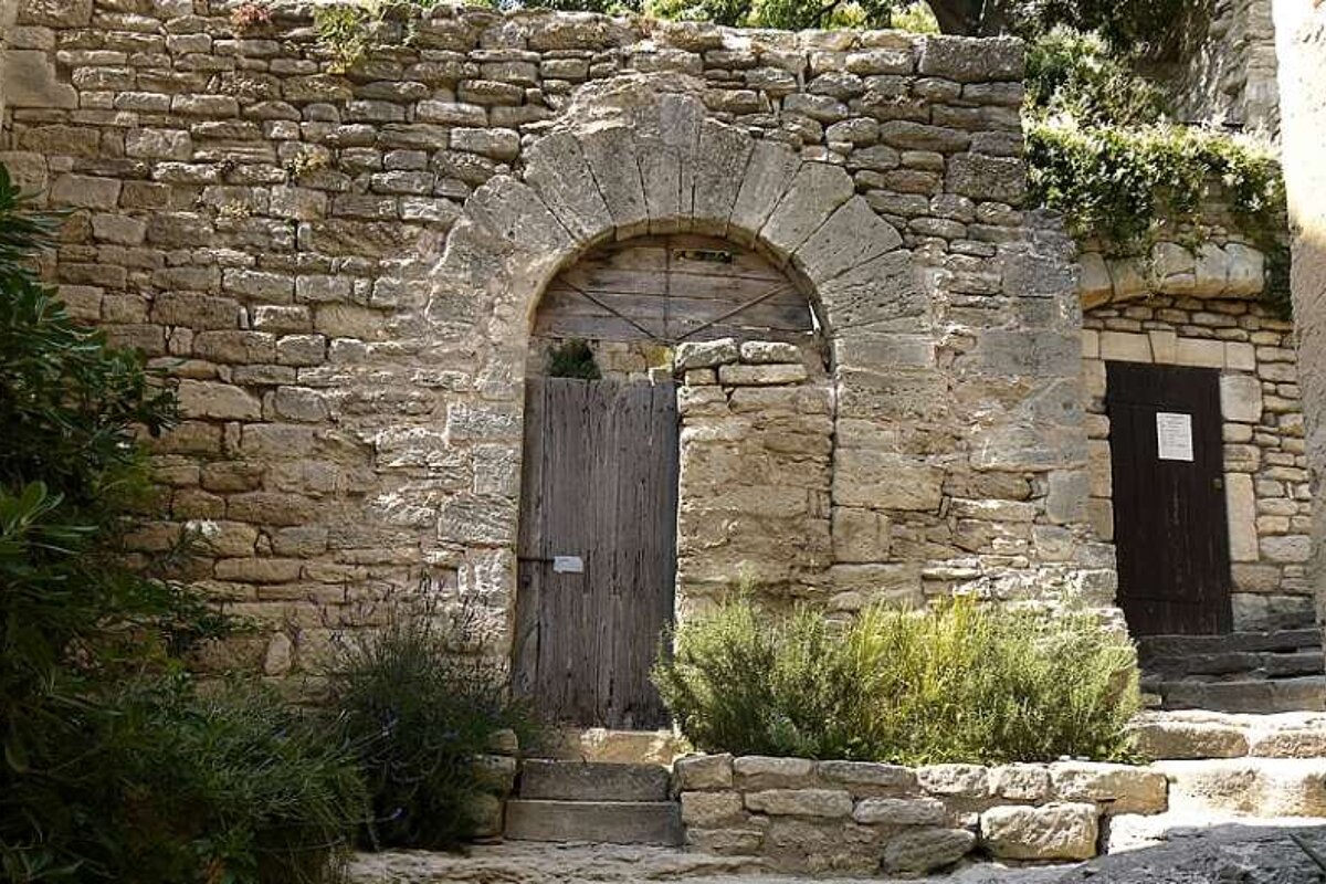 an image of a door and lane in provence