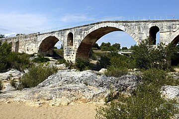 an image of a roman arched brigde in provence