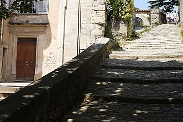 an image of stone steps and a lane