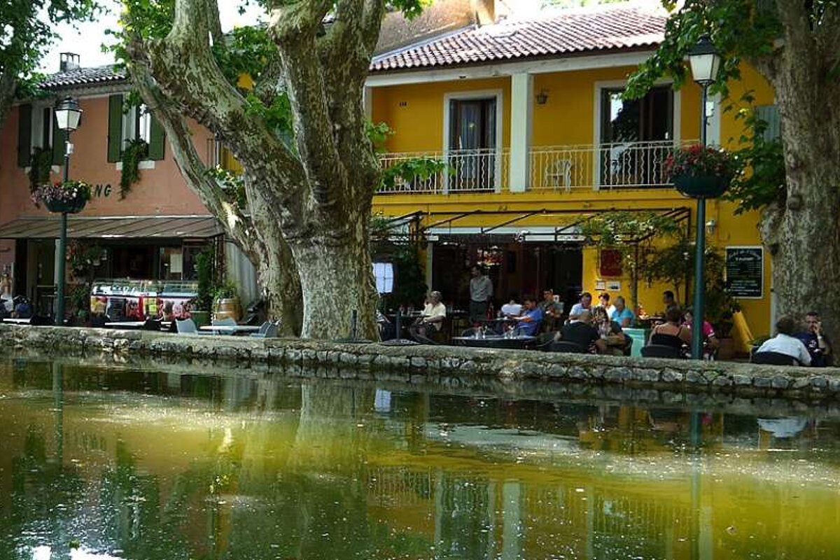 an image of a water reservoir and a pavement cafe