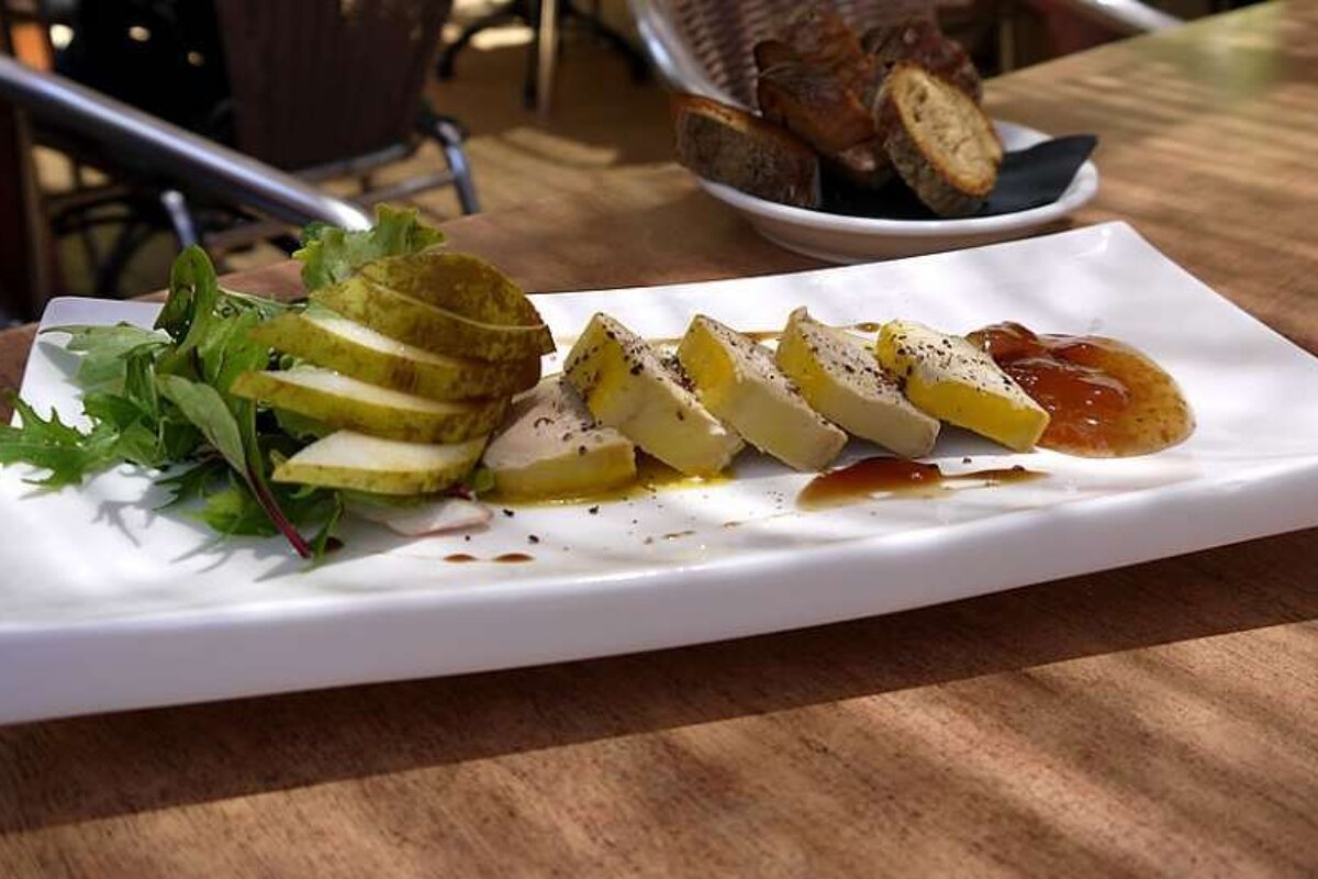 a photo of some sliced pate on a plate