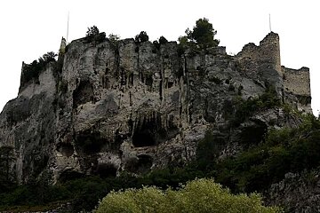 a photo of a castle on a rock