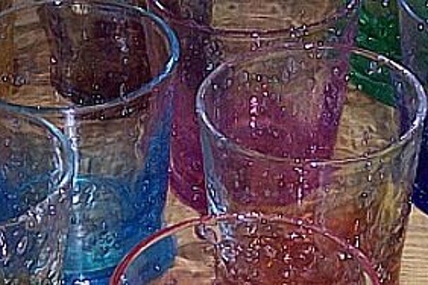 various coloured glasses on table