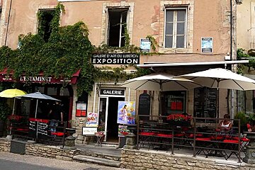 a photo of a street cafe
