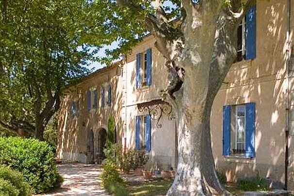 a photo of a house and trees