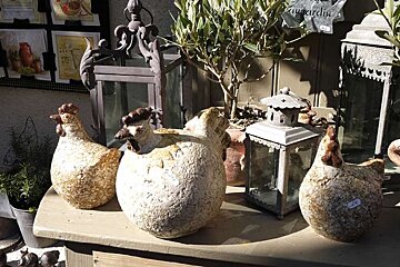 a photo of clay chickens