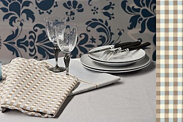 table with table cloth. glasses and crookery 