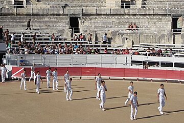 photo of men in an arena