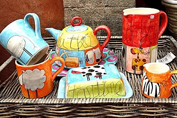 a photo of a colourful tea set
