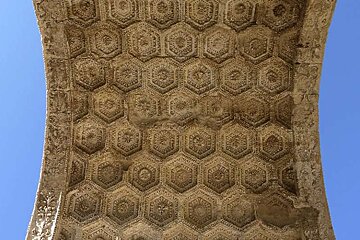 photo of the inside of a stone arch