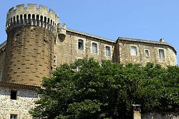 photo of a castle and its turret