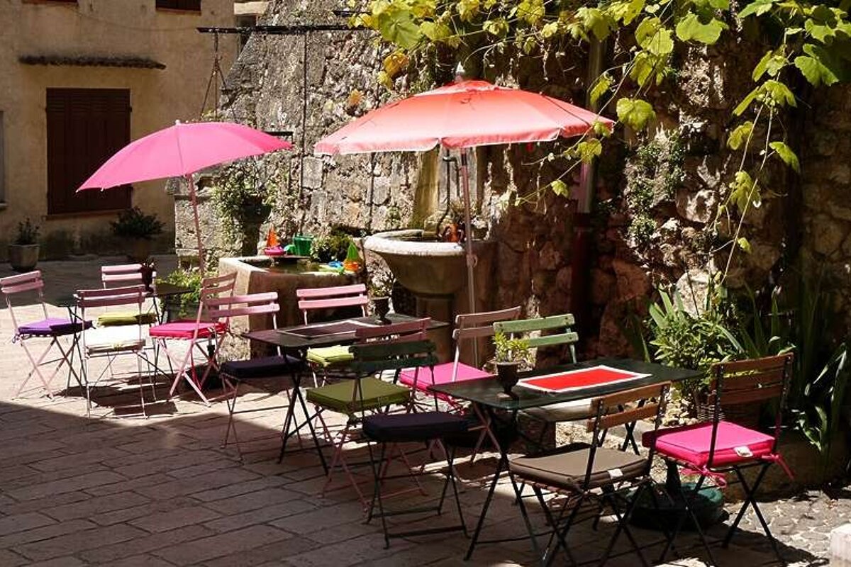 photo of tables and chairs on a lane