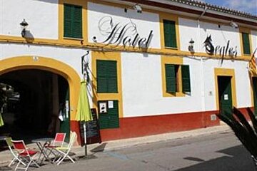 an image of the outside of a hotel with the name on the wall