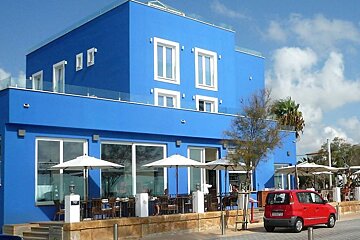photo of a blue square building