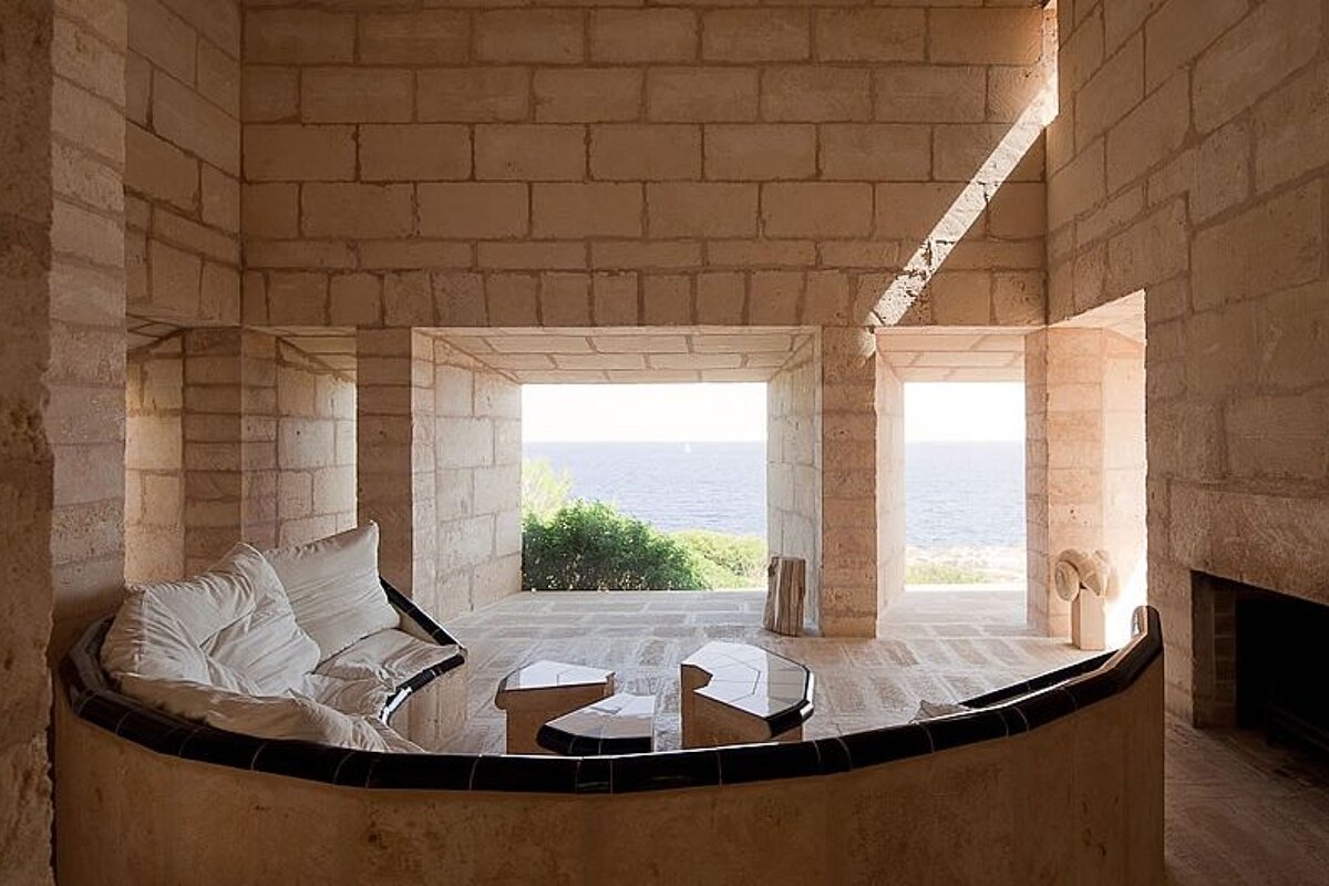photo of a living room overlooking the sea