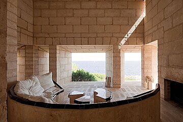 photo of a living room overlooking the sea