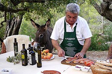 photo of a chef preparing food at a picnic