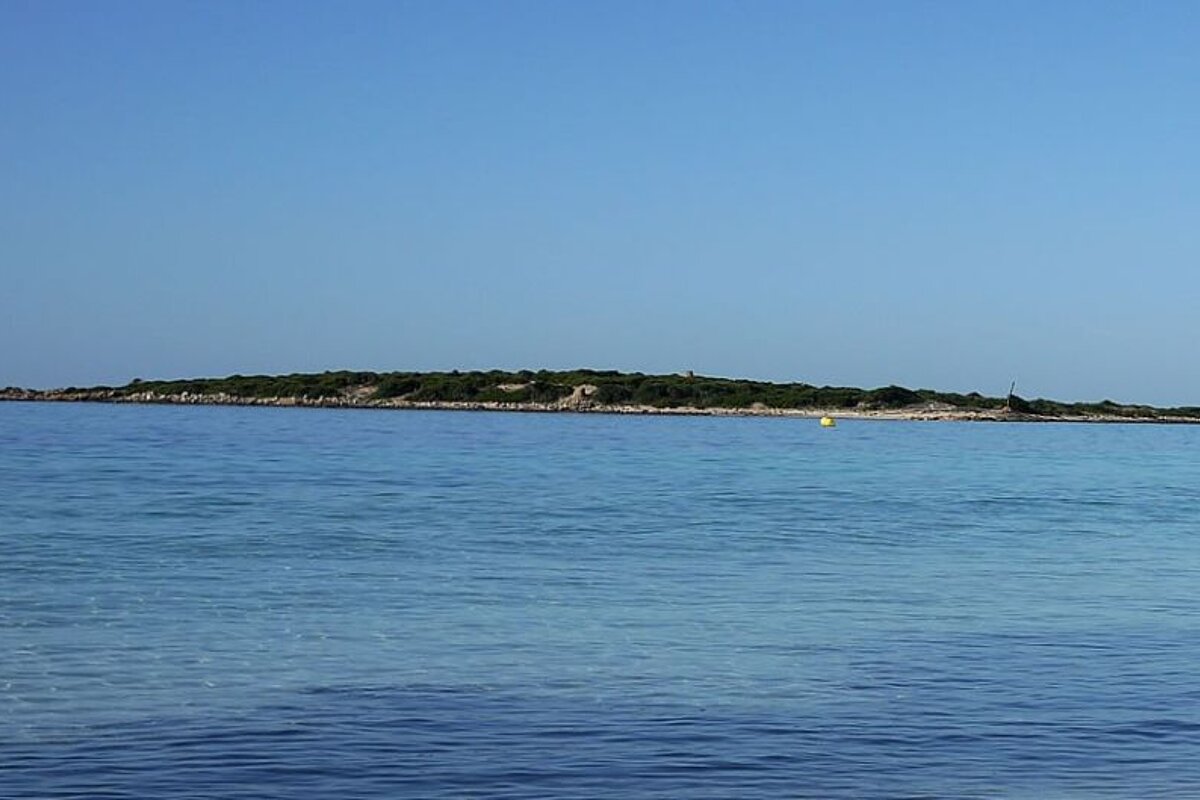 photo of an island and sea 