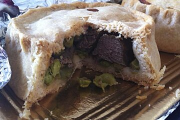 A pie with a bite taken out of it