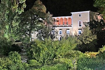 photo of a manor house at night