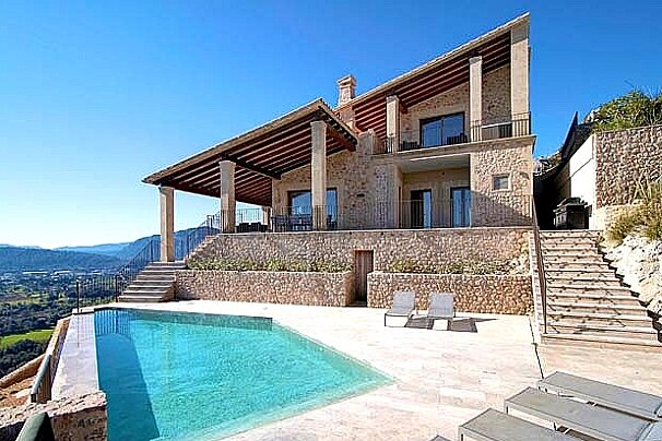 spanish property overlooking pool