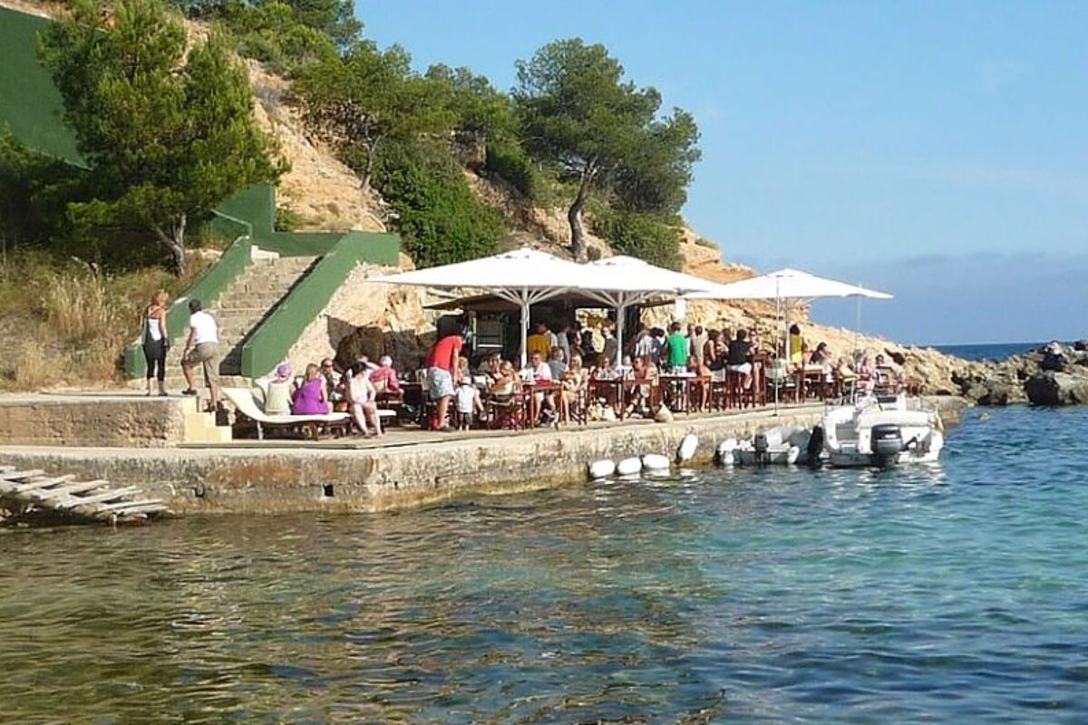 photo of a bar next to the sea