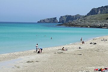 photo of a beach with blue seas