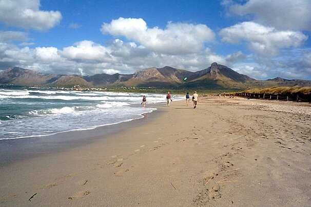 photo of a beach and hills