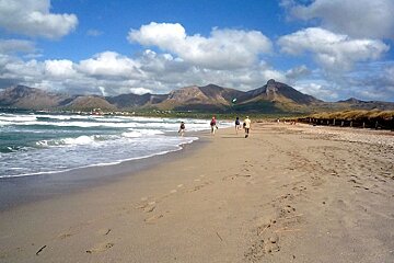 photo of a beach and hills