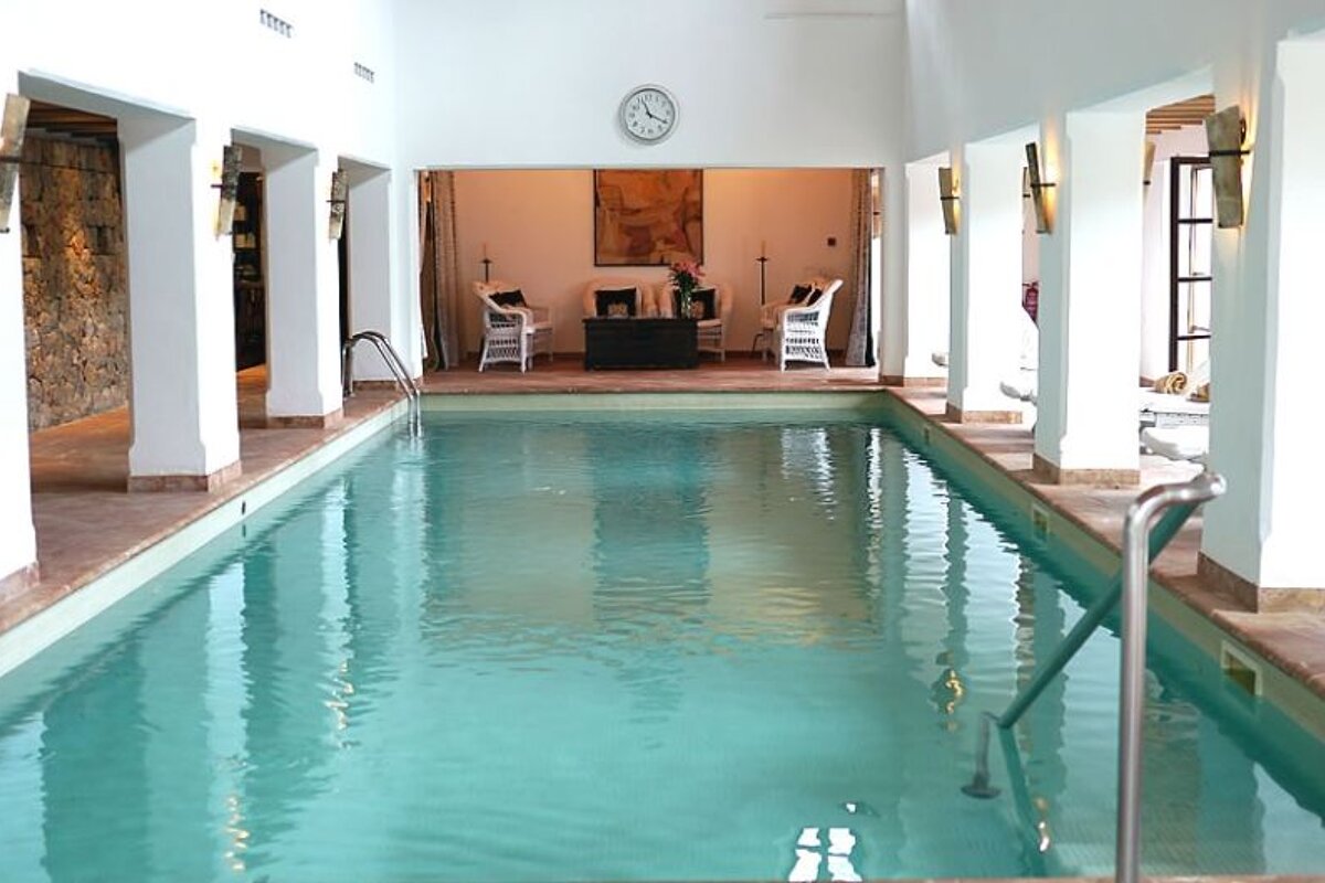 a photo of an indoor swimming pool