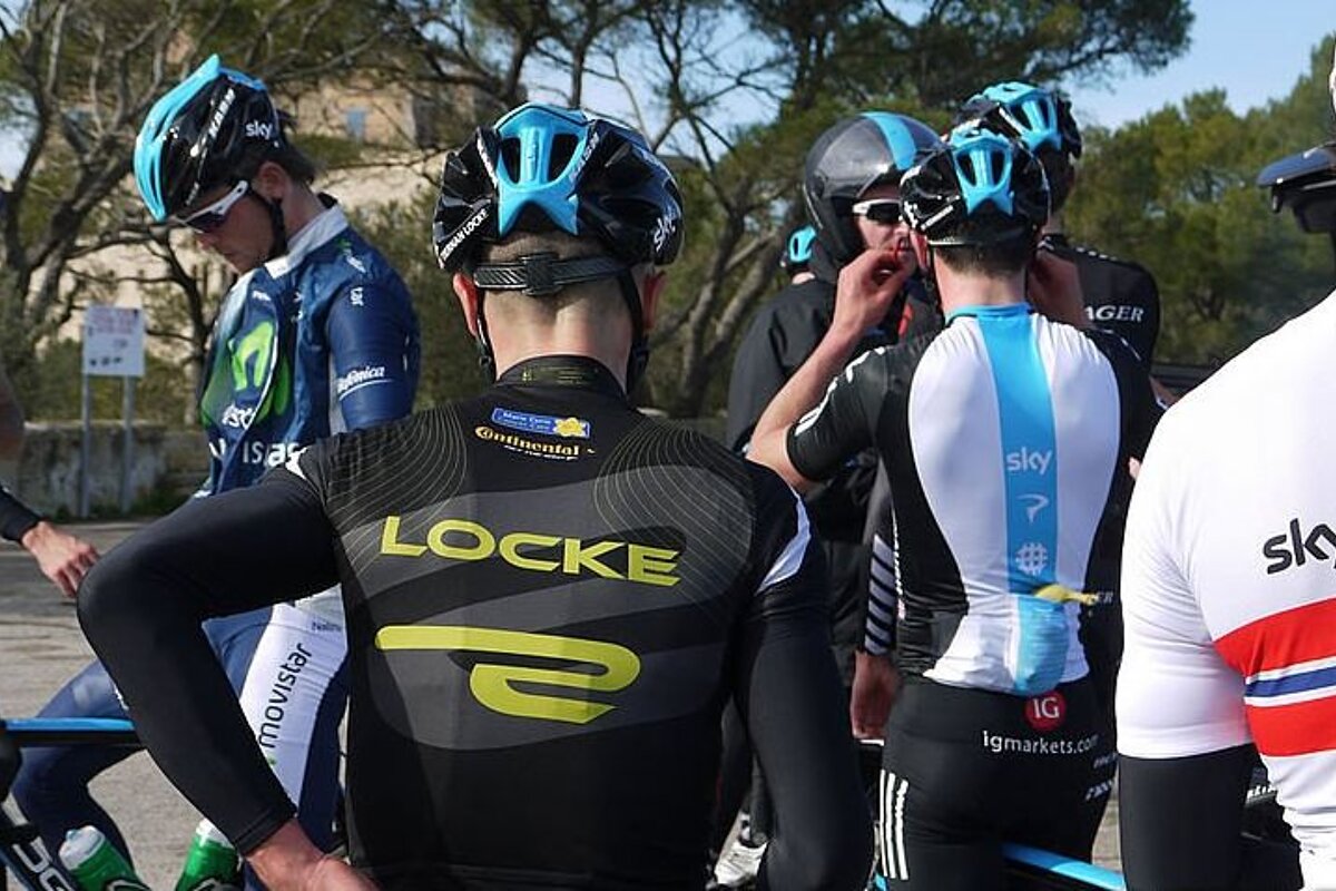 photo of pro cyclists on a road