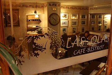 looking through a window into restaurant Las Olas