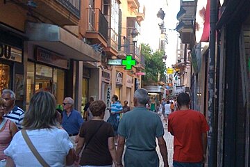 a photo of shoppers out for late night shopping in palma