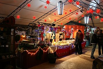 Christmas market stalls under canvas
