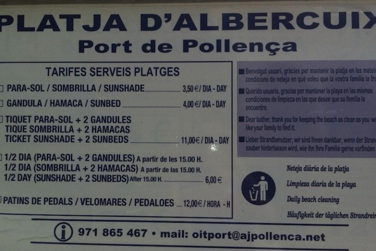 a photo of a beach sign