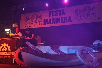 photo of a boat and DJ for a party