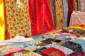 a photo of shawls at market mallorca majorca