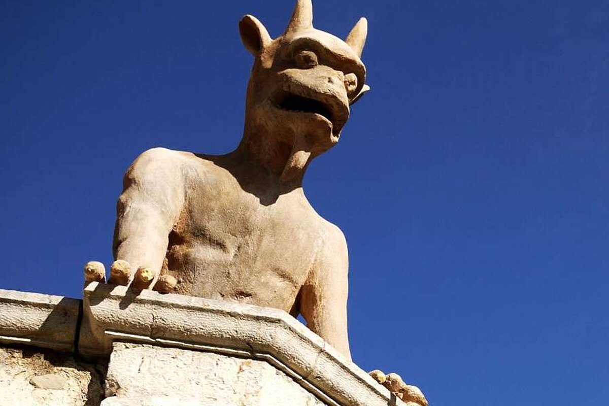 a photo of a devil sculpture in majorca