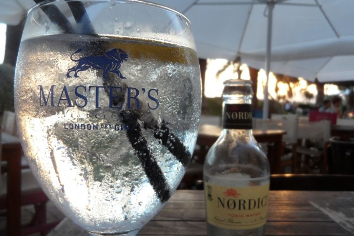 Sun through a glass of gin and tonic