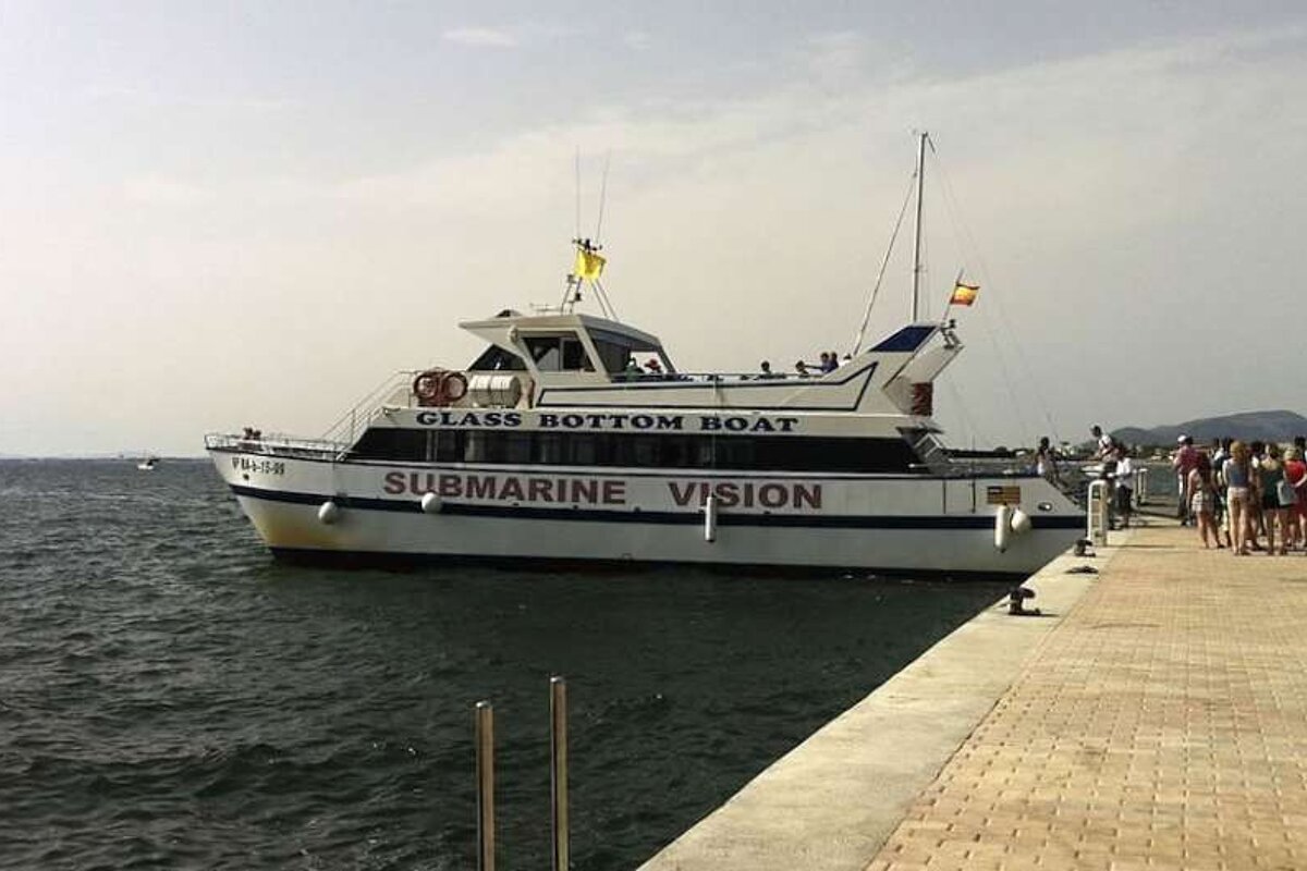 photo of a boat and sea