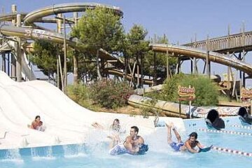 an image of people using water slides