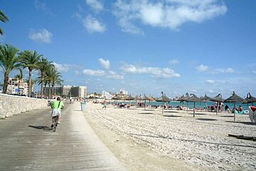 a photo of the cycle path by the beach in cala estancia majorca