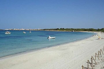 white sand and blue water